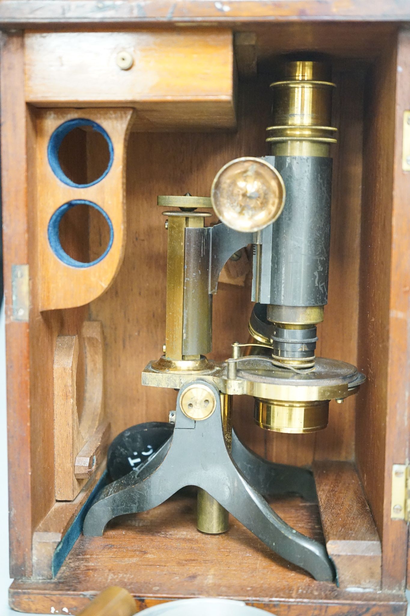 A Victorian microscope, in a mahogany case